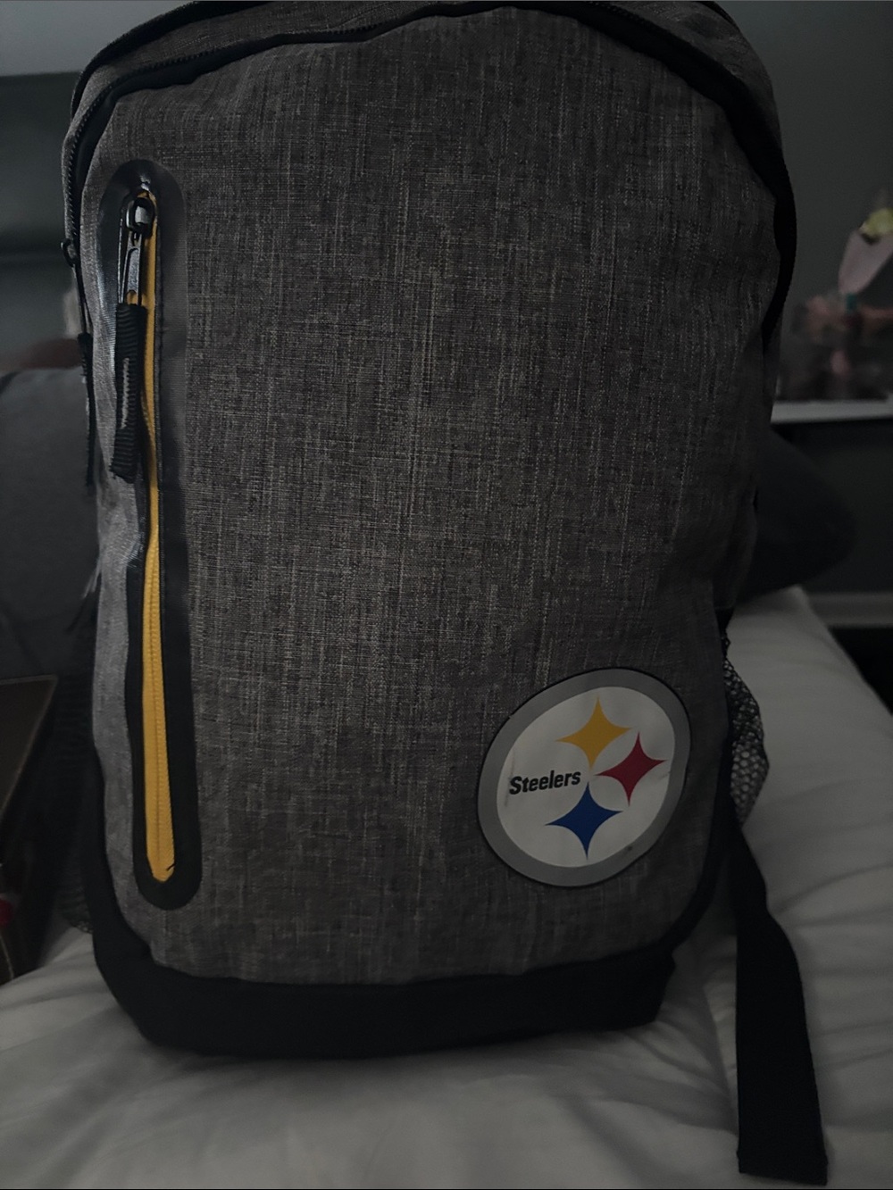 Gray Travel Backpack with Yellow Accents